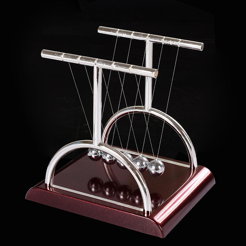 Newton pendulum perpetual mover collision ornament