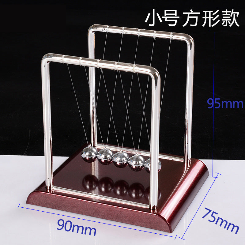 Newton pendulum perpetual mover collision ornament