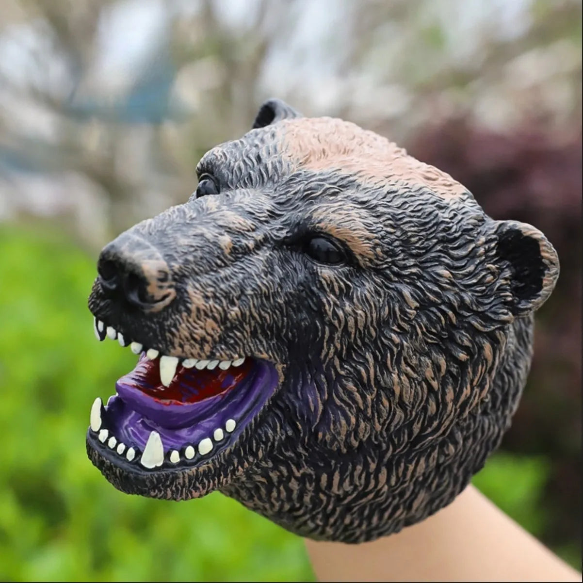 Soft rubber tyrannosaurus rex simulates animal bite