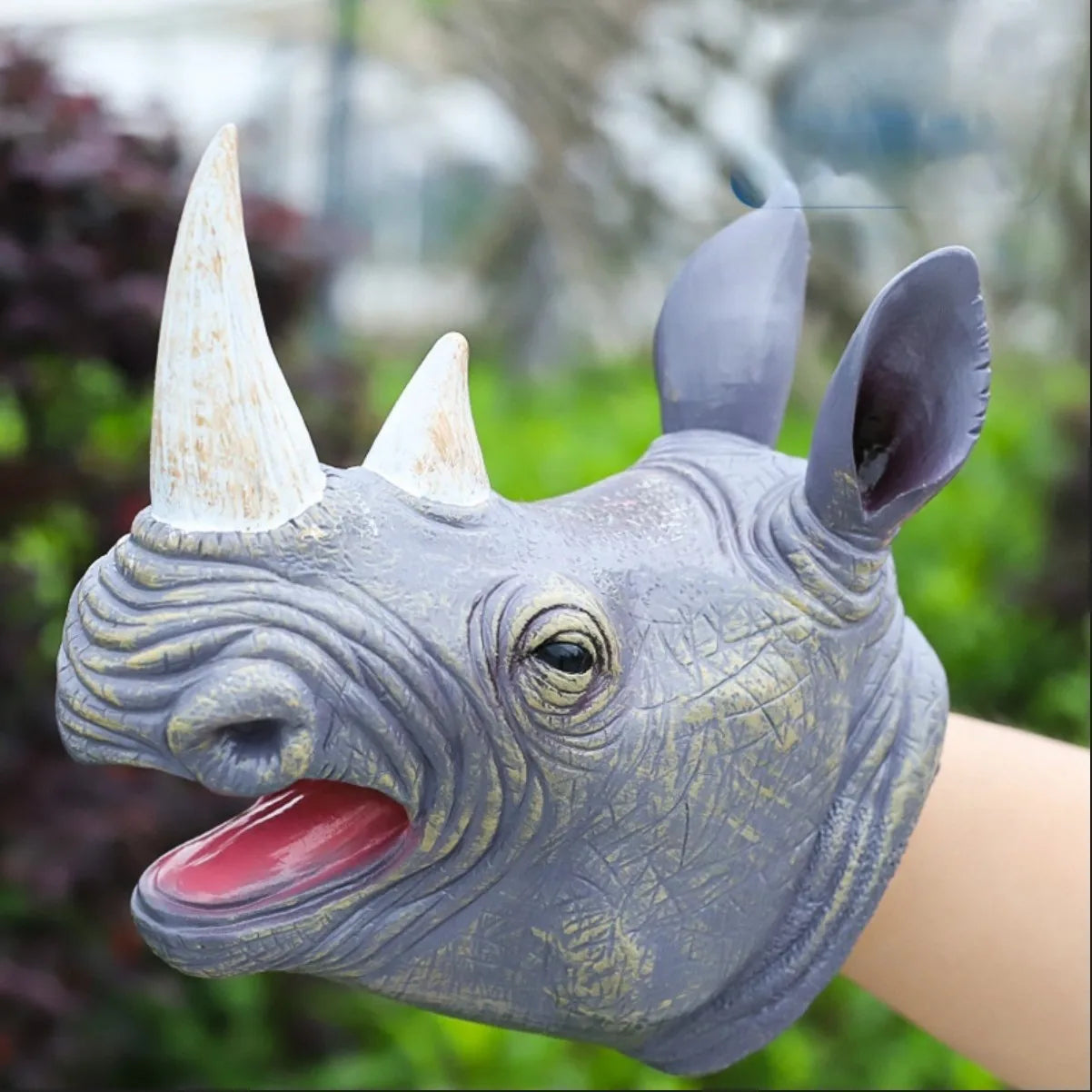 Soft rubber tyrannosaurus rex simulates animal bite