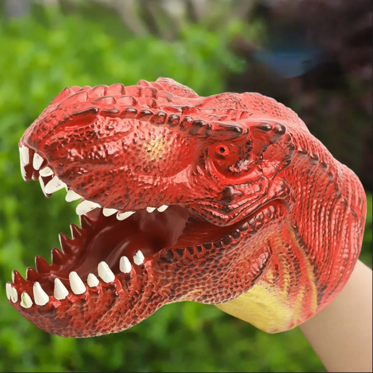 Soft rubber tyrannosaurus rex simulates animal bite