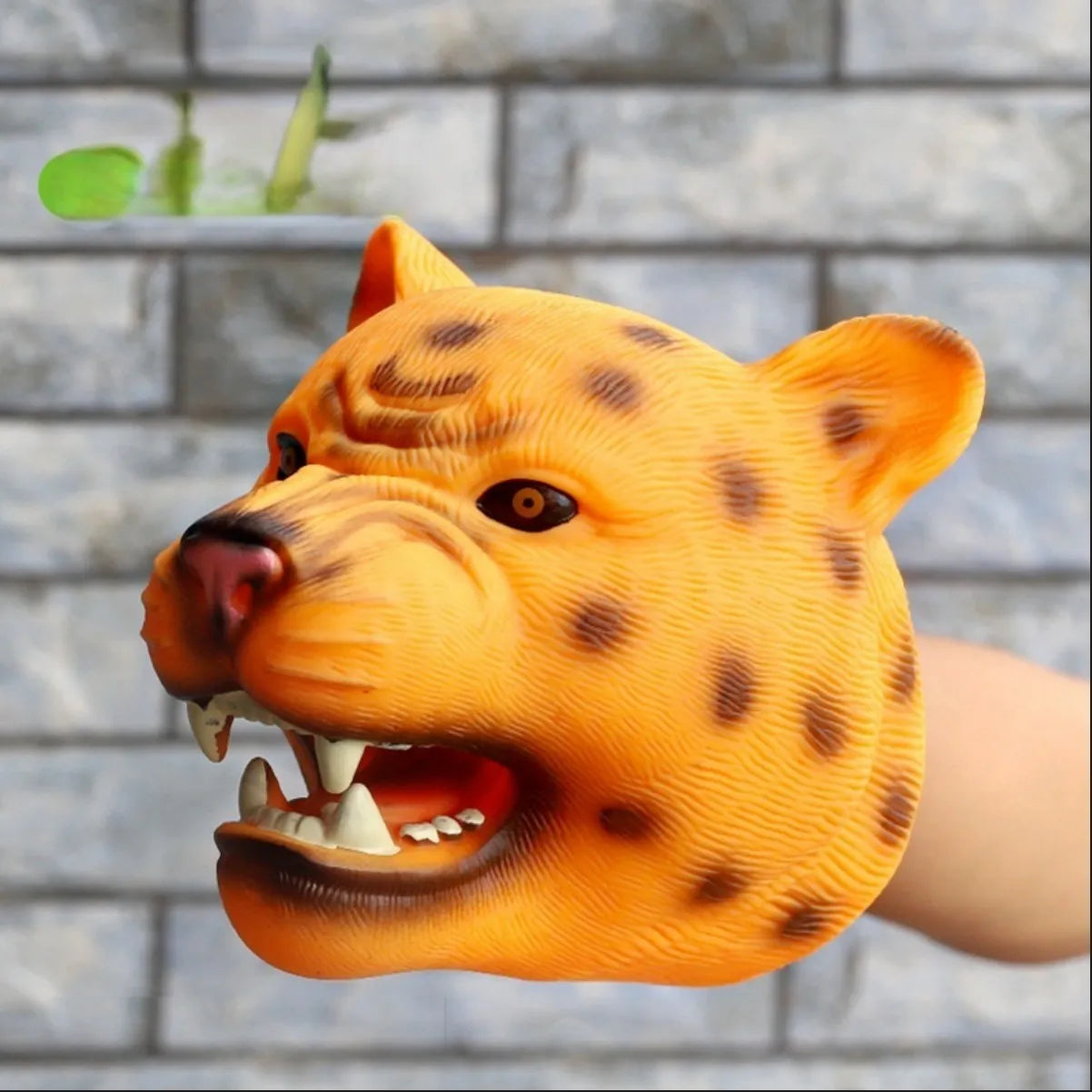 Soft rubber tyrannosaurus rex simulates animal bite