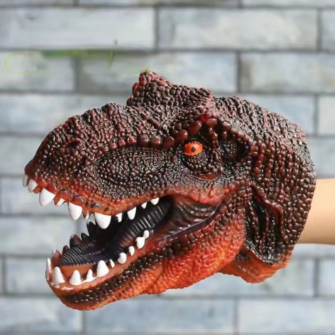 Soft rubber tyrannosaurus rex simulates animal bite