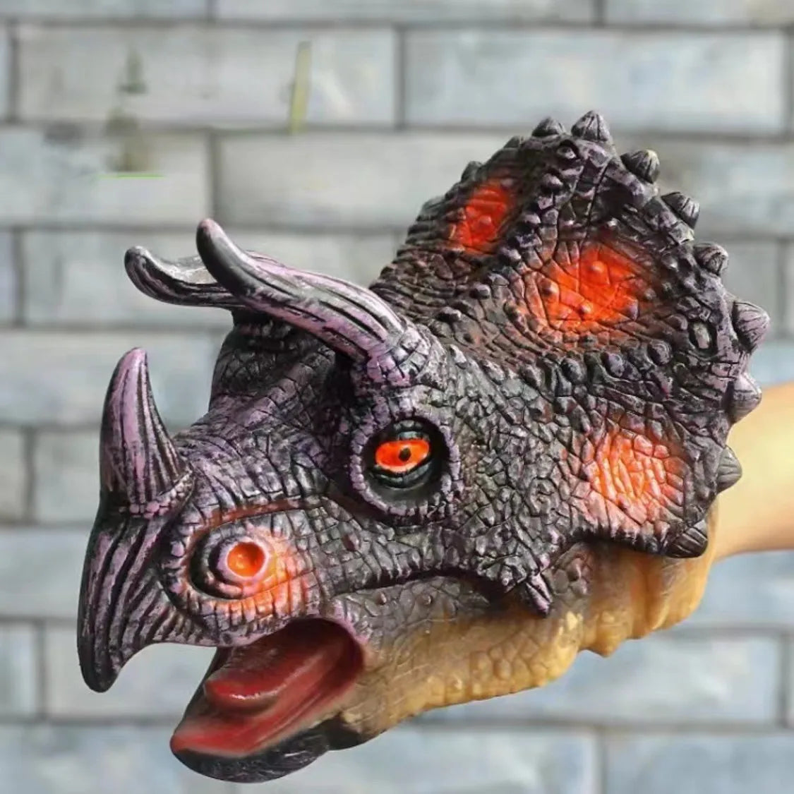 Soft rubber tyrannosaurus rex simulates animal bite