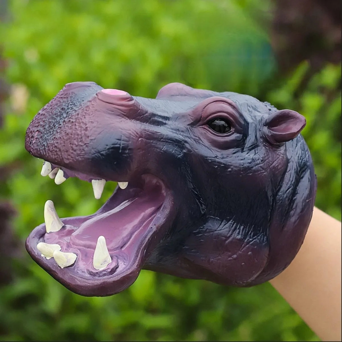 Soft rubber tyrannosaurus rex simulates animal bite