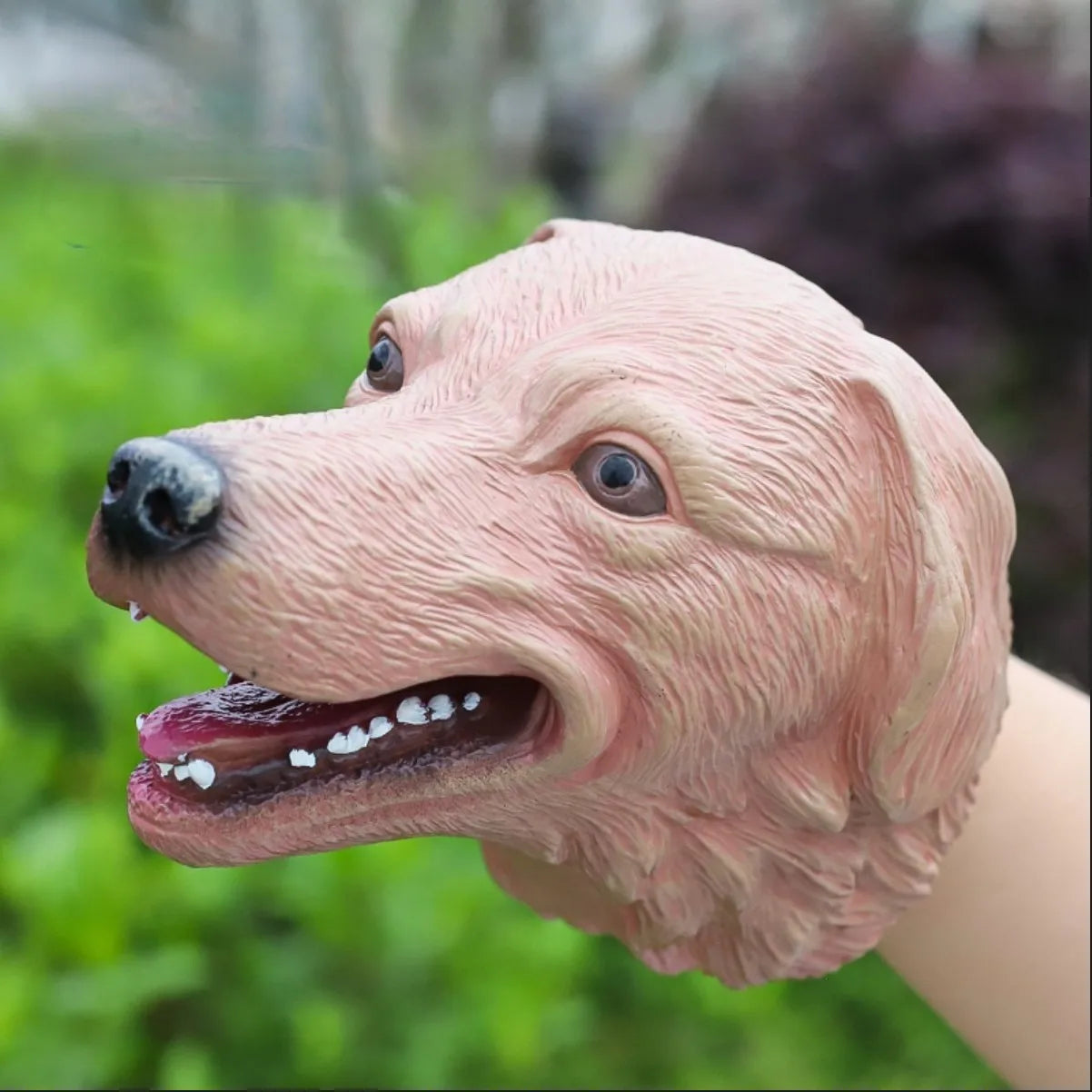 Soft rubber tyrannosaurus rex simulates animal bite