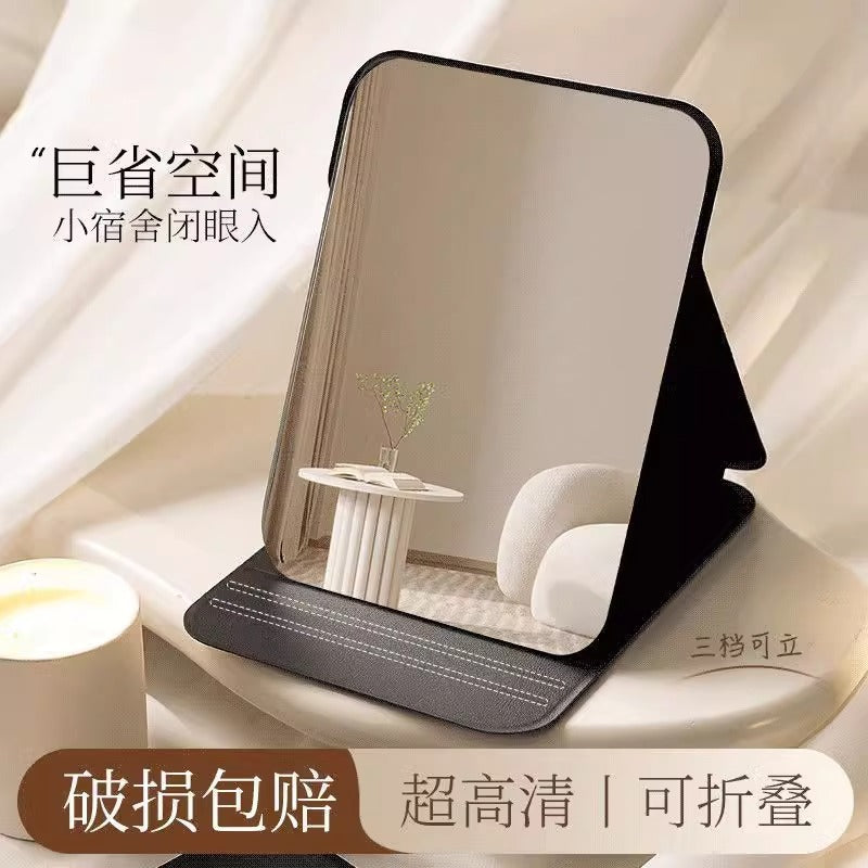 Folding vanity mirror